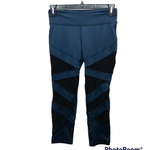 The Warmup by Jessica Simpson. Blue leggings with black mesh zigzag detail legs